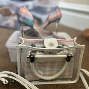 This is a bundle. The heels and the purse are from call it spring